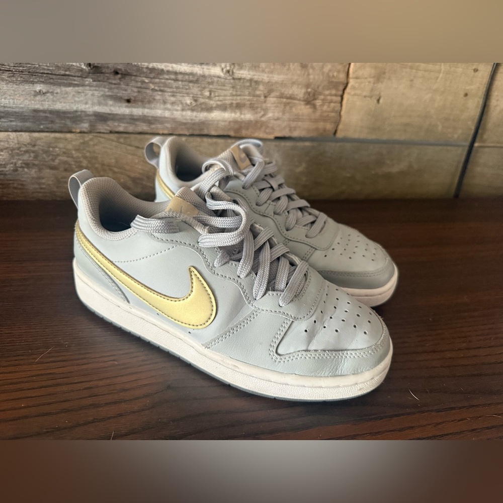 Nike Sneakers in Gray with Gold Accents